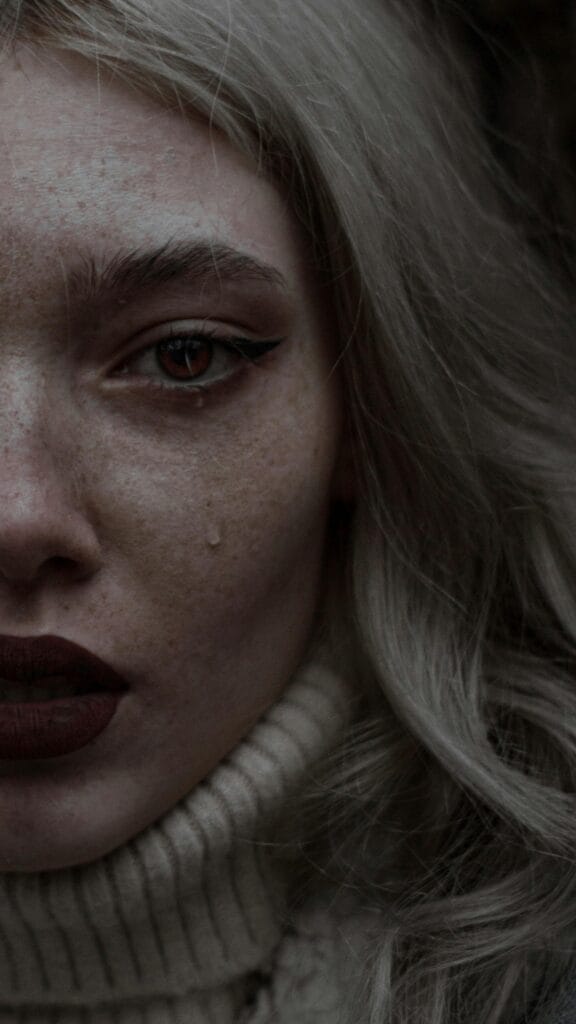 Close Up Photo of a Woman Crying