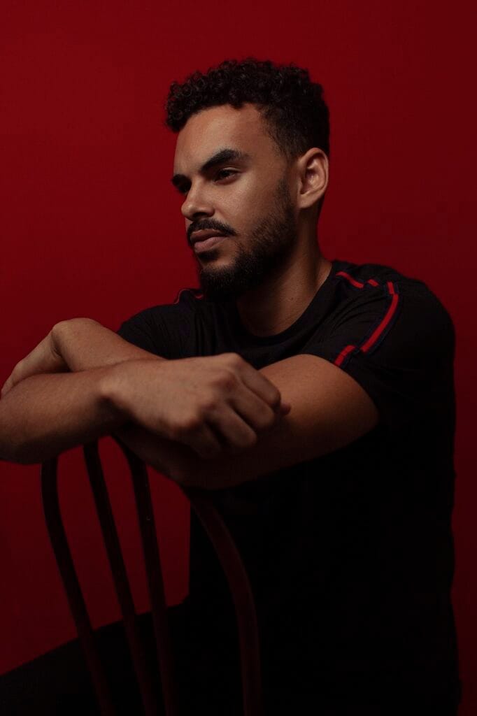 man, portrait, sitting on a chair